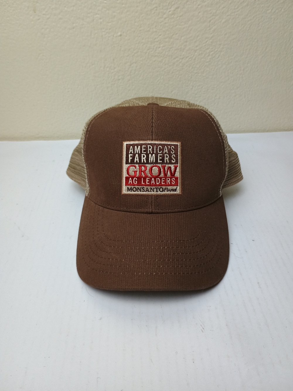 Monsanto Brown Trucker Hat - "America's Farmers Grow" Patch